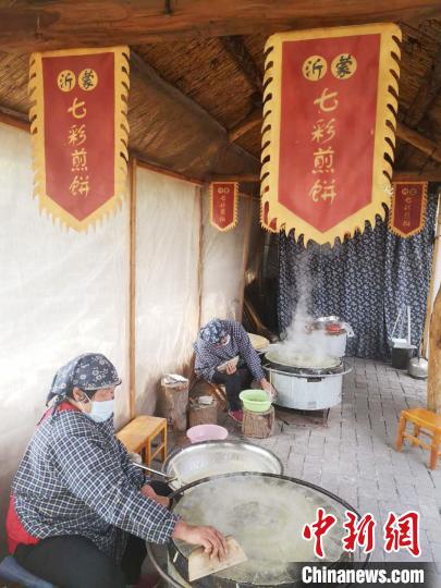 山东沂蒙老区出炉“七彩煎饼” 成山村脱贫致富“拳头”产品-图片2